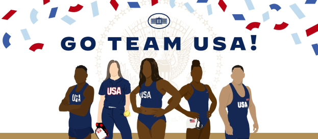 Das US-amerikanische Frauen-Volleyballteam steht vor einem weißen Hintergrund mit der Aufschrift "Go Team USA" in fetten, bunten Buchstaben.