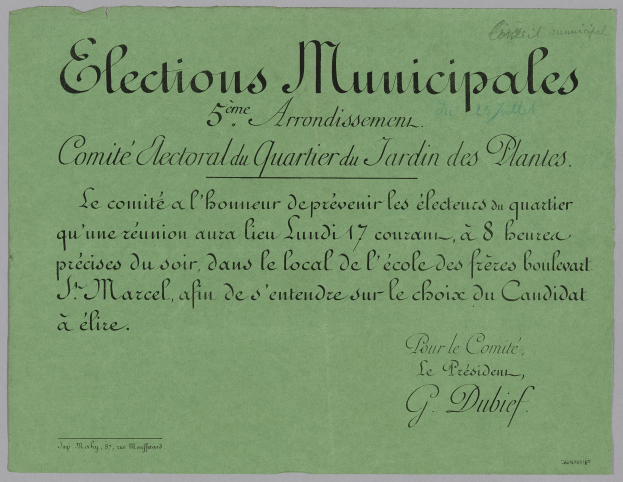 Ein grünes Papier mit den Worten 'Elections municipales' darauf vor einem weißen Hintergrund.