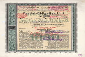 Ein altes deutsches Wertpapier, das von der deutschen Regierung ausgegeben wurde und Text sowie einen Stempel enthält.